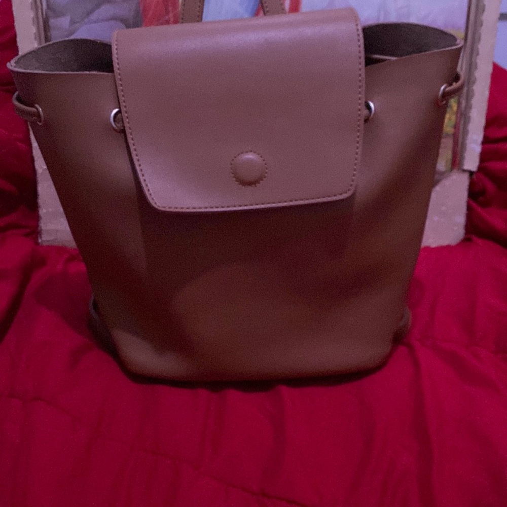 Brown mini backpack 3.5in long 4in deep